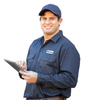 brown heating and cooling air conditioning technician with an Ipad