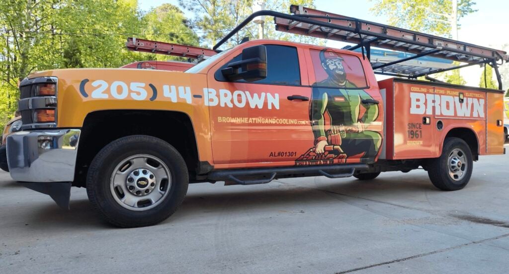 Brown Heating and Cooling service truck for HVAC, plumbing and electrical services in Birmingham Alabama